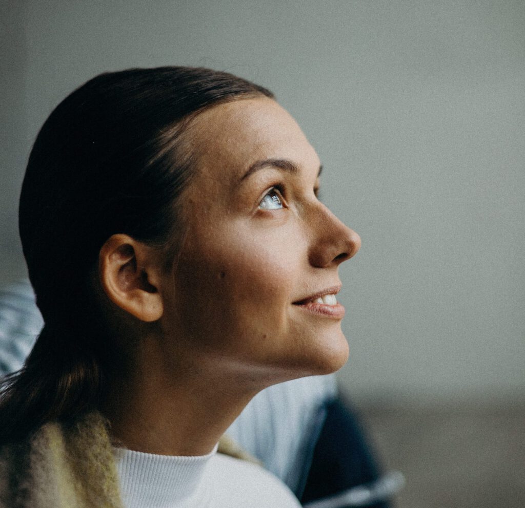 Woman looking up and forwards to the future.