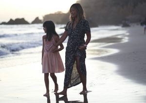 Family on beach.