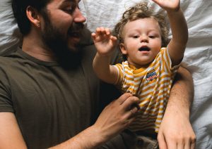 Father and son playing together.