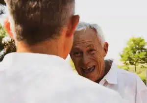 Grandfather and son meeting each other.