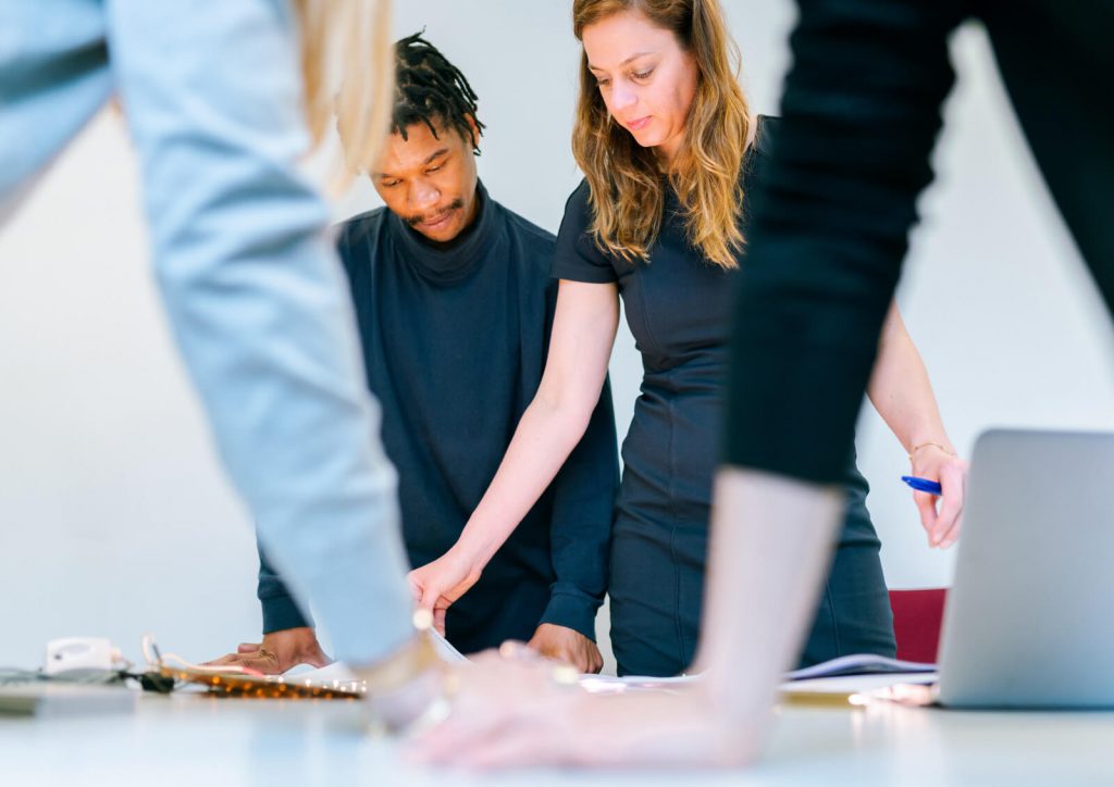 People working together at a table.