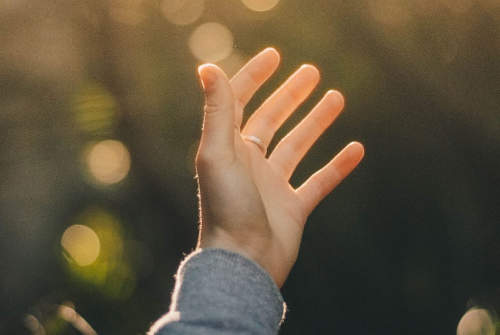 An open, outstretched hand.
