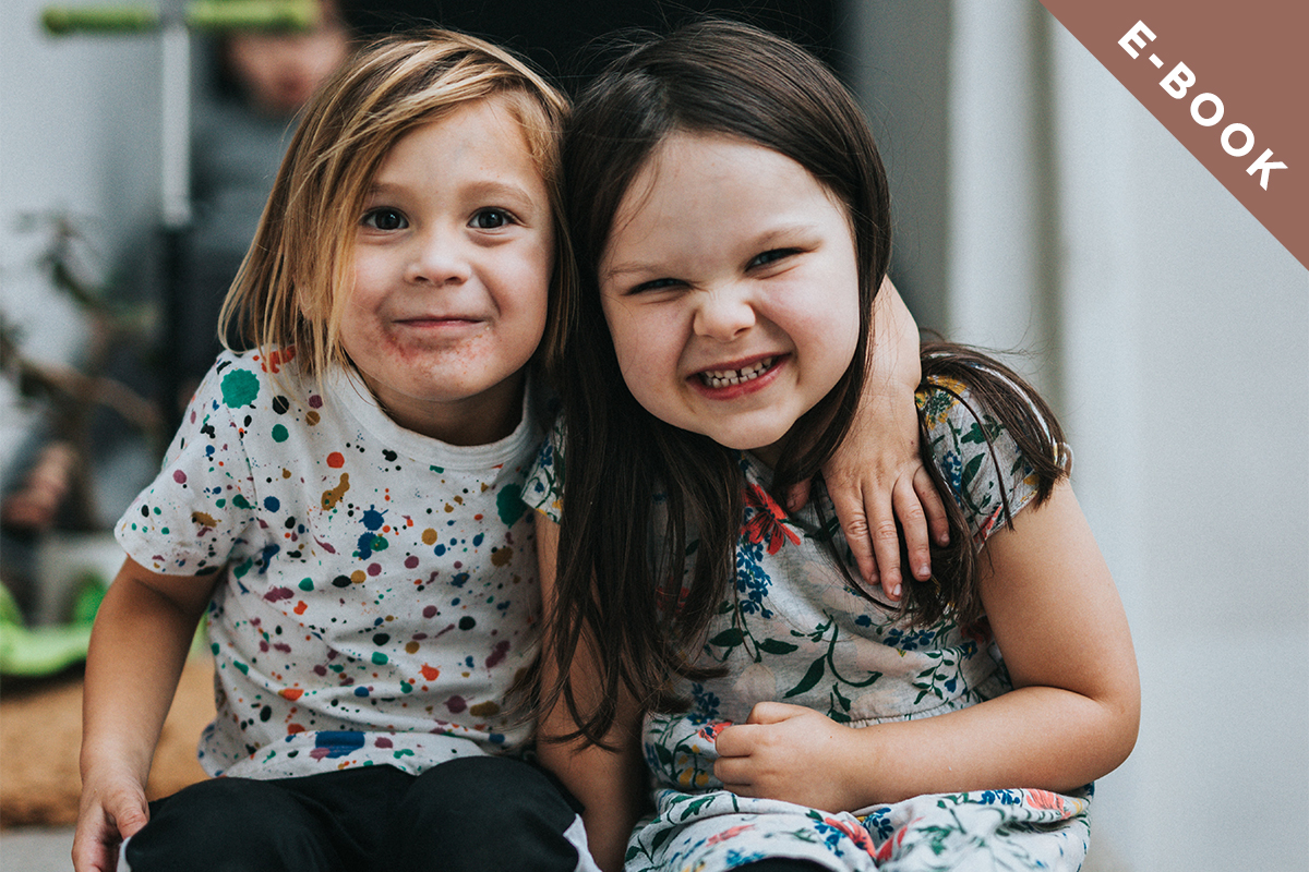 Two children smiling