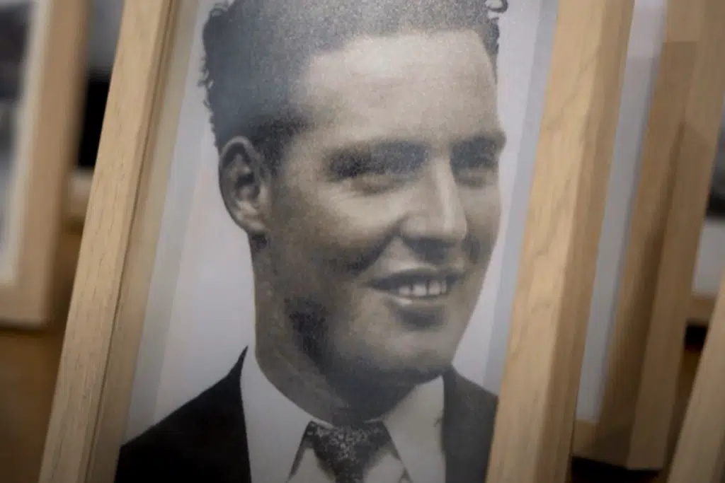 A framed photo of Mavis' brother John